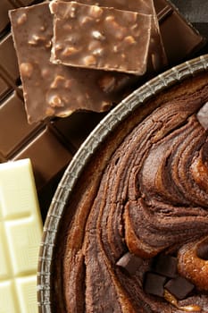 Chocolate cake crop macro texture, golden light, studio shot
