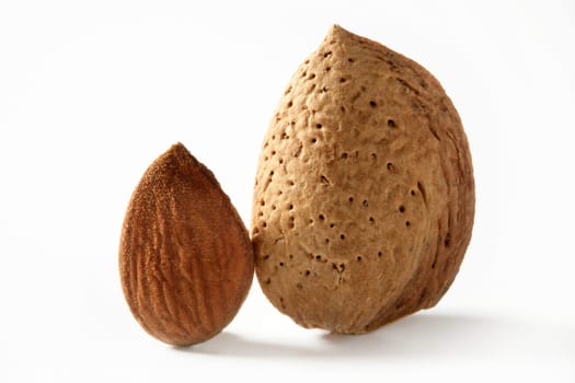 Almond macro image over white background, studio shot