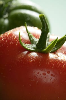 Two color tomatoes, green and red variety, studio shot