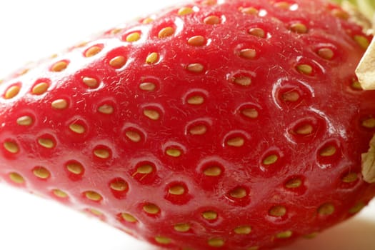 Strawberry macro detail. studio shot white background