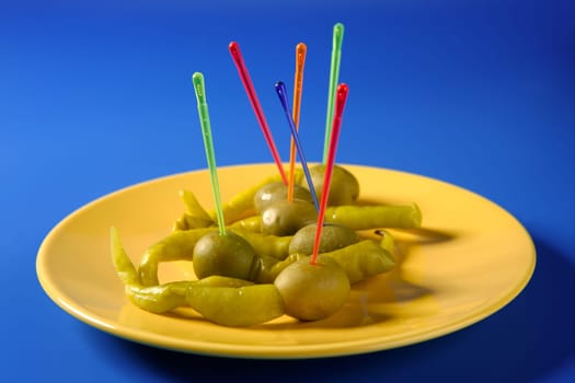 Tapas from Spain, olives and hot green pepper snack