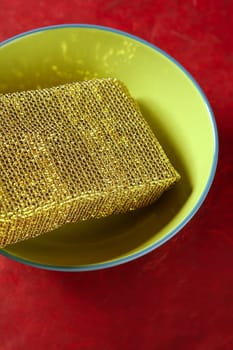 Housewife cleaning tools metaphor, sponge and bowl