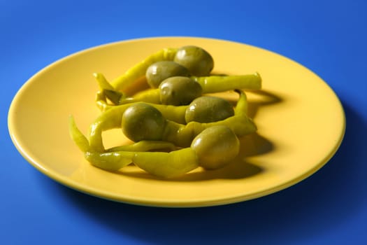 Tapas from Spain, olives and hot green pepper snack