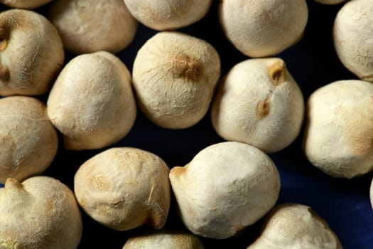 dry chickpeas detail in macro crop, studio shot