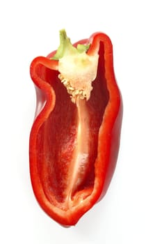 Half cut macro red pepper isolated over white background