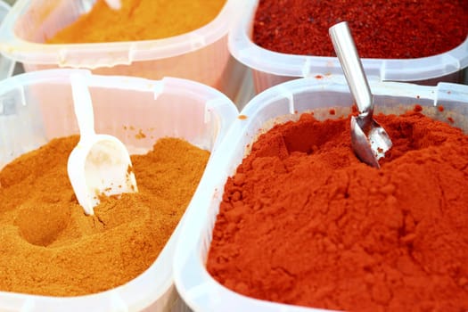 saffron paprika curry yellow orange spices in market