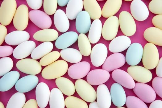 sugared almond sweet  candy pastel colorful on soft pink