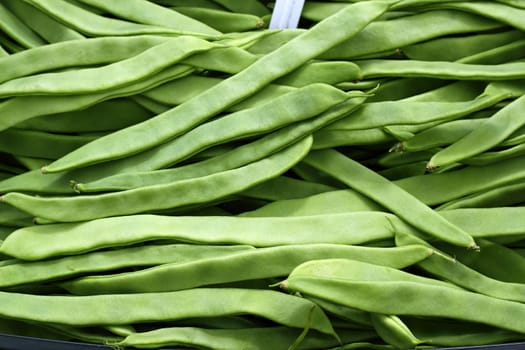green beans vegetable texture in Spain market food background