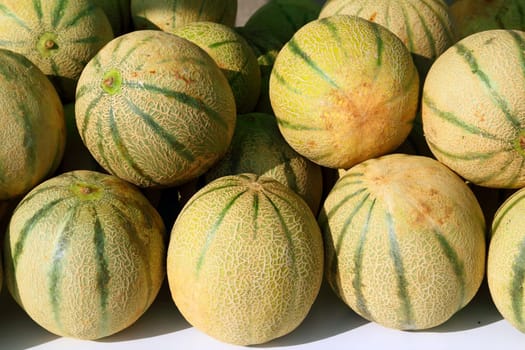 Cantaloupe rock melon muskmelon spanspek stacked on market