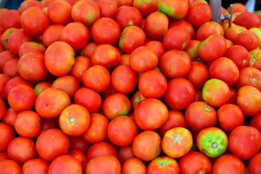 red tomato mound in vegetables market pattern background