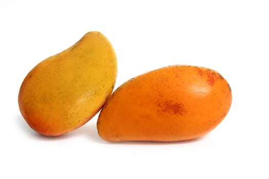 delicious mango tropical fruit isolated on white