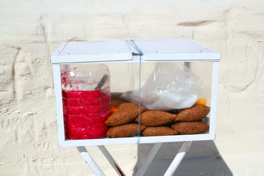 Kibis yucatecos mayan food from Mexico in portable glass box