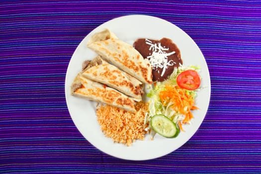 Burritos mexican rolled food rice salad and frijoles Mexico food