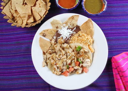 Chicken tacos Mexican style chili sauce and nachos Mexico food