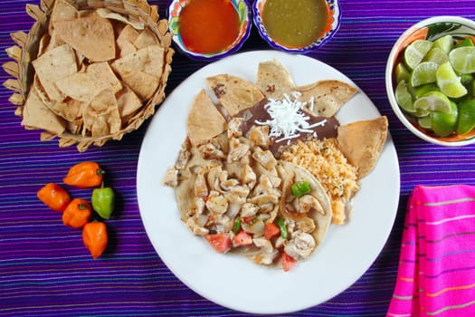 Chicken tacos Mexican style chili sauce and nachos Mexico food
