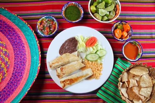 Burritos mexican rolled food rice salad and frijoles Mexico food