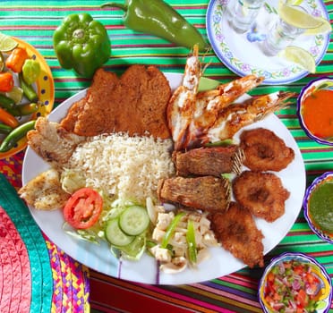assorted grilled seafood in Mexico tequila chili hot sauces