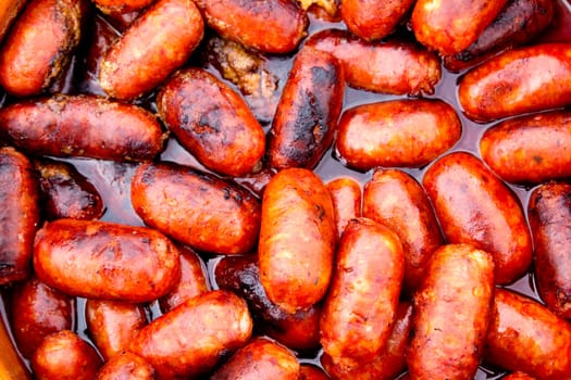 chorizo red sausages fried in oil Spain typical food