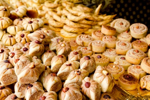 arab sweet pastries cakes stacked bakery with nuts