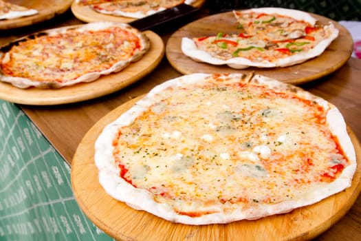 Mediterranean colorful thin pizza baked food focus on foreground