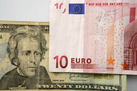 Dolar versus euro notes, finance metaphor image