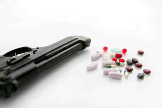 gun or pills two options to suicide, metaphor on white background