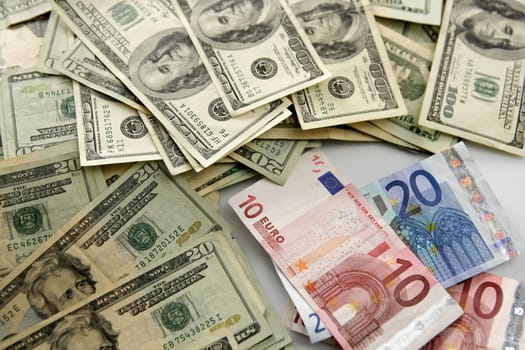 Dolar versus euro notes, finance metaphor image