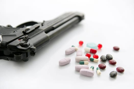 gun or pills two options to suicide, metaphor on white background