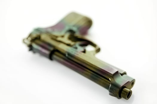 black hand gun pistol over white background, selective focus, studio shot
