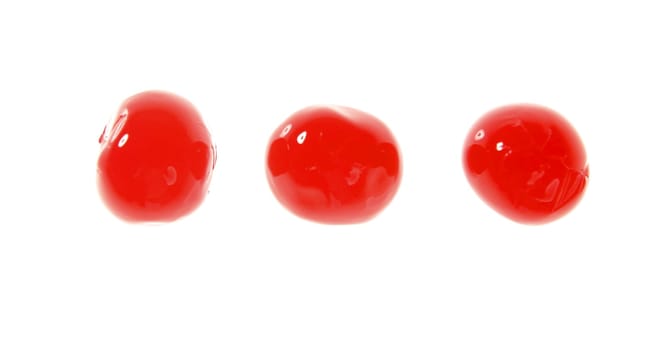 three cherry red fruits macro isolated over white background