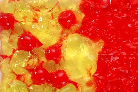 lemon and strawberry red and yellow jelly macro texture
