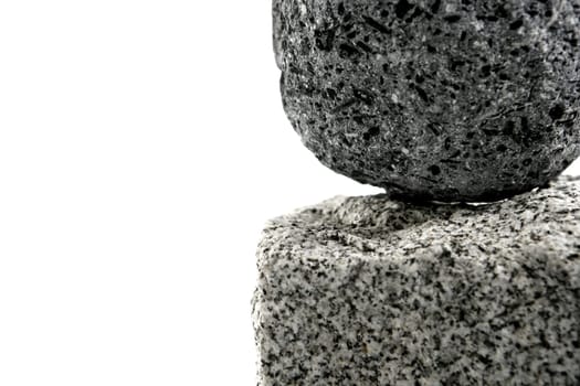 Volcanic Pumice, over granite brick stone on white background