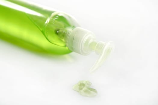 Aloe vera green gel transparent bottle, studio shot