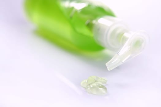 Aloe vera green gel transparent bottle, studio shot