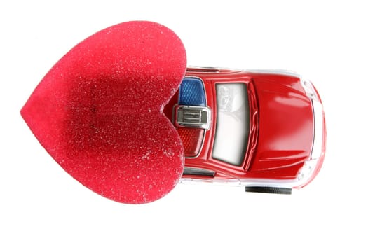 Red police car in Valentines day, good heart metaphor