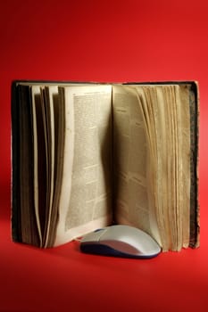 Old aged  book and computer knowledge technology evolution