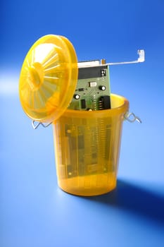 technology circuit on the trash, electronic tech metaphor