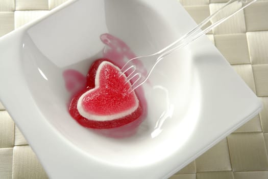 Eat a jelly strawberry bloody heart romantic metaphor