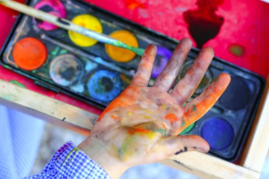 artist children painting watercolor brush self dirty hands