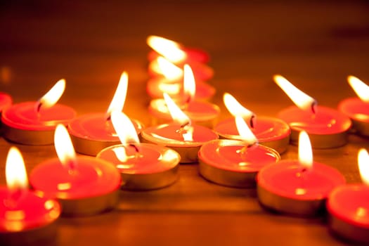christmas candles pentagram star on golden warm wood