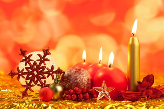 christmas red snowflake with candles on bokeh lights background