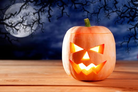halloween lantern pumpkin  in dark sky clouds moonlight