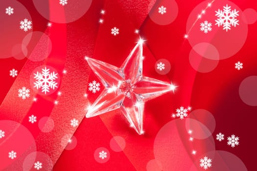 christmas glass star on red ribbon background