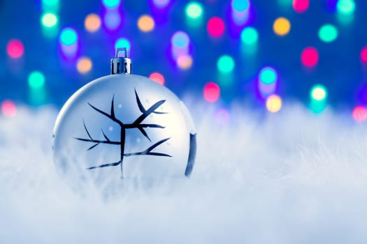 Christmas babule in silver with tree and colorful lights