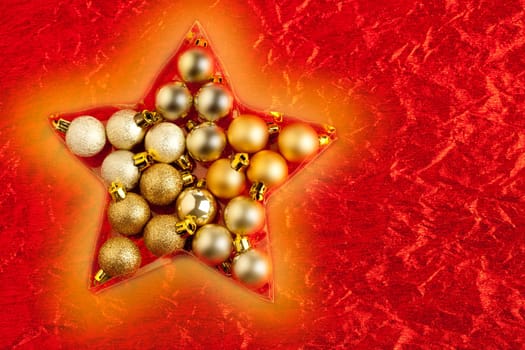 christmas baubles in star shape on red background