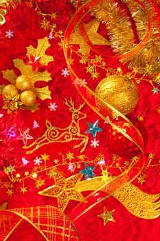Christmas card background golden and red with baubles stars santa reindeer