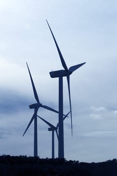 aerogenerator electric windmill cloudy sky view