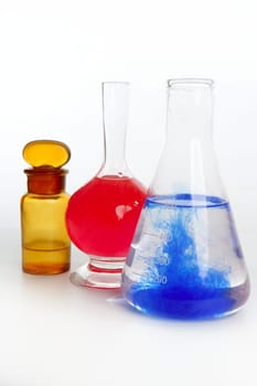 Chemist research laboratory with chemical colorful equipment over white