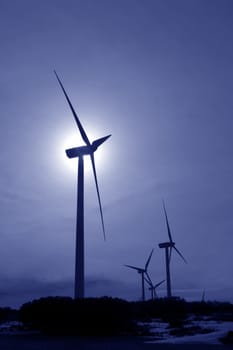 aerogenerator windmill backlight blue sky