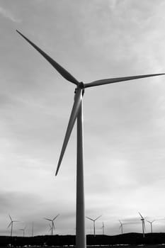 aerogenerator electric windmill cloudy sky view